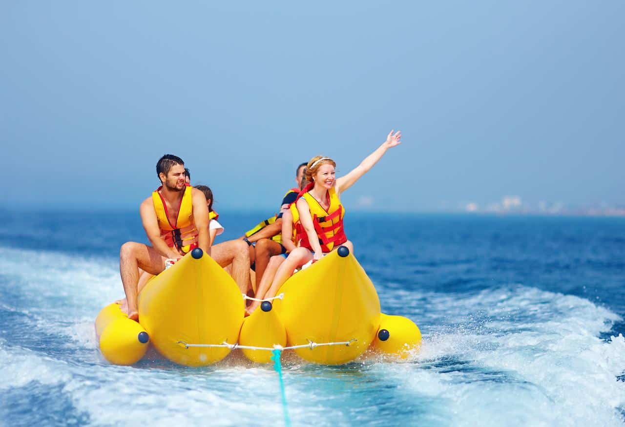 Fun in the Sun. People in the Banana Ride