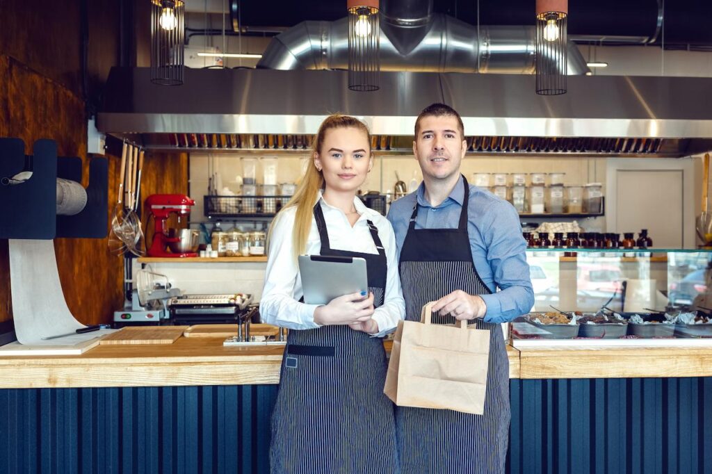 Small Business Owners Smiling 