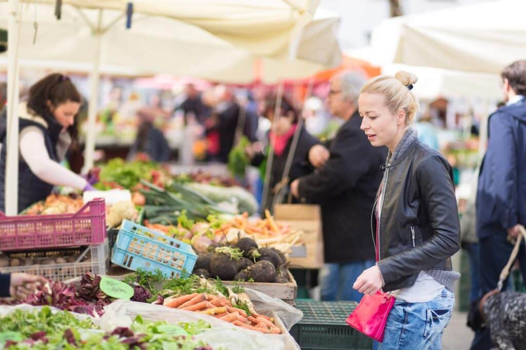 Woman Buying Vegetable at Food Market 